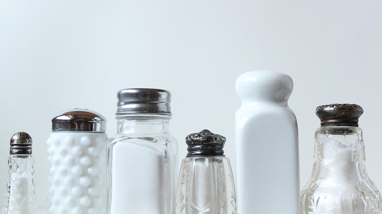 Close-Up Of Bottles Against White Background