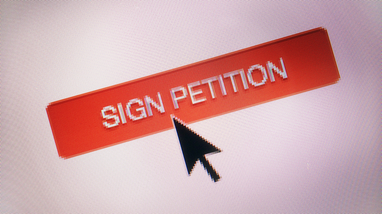 Close-Up Of Cursor On Sign Petition Icon