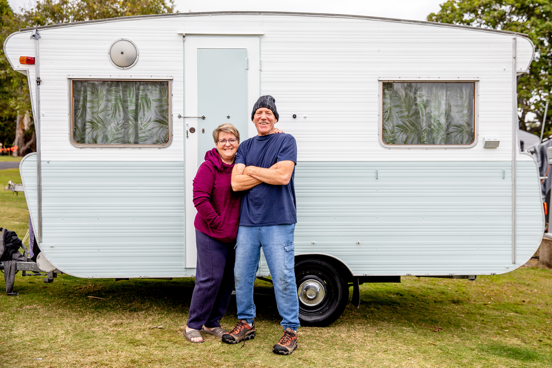 Grandparents with grandkids at campground with their caravan