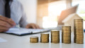 Stack Of Coins On Desk