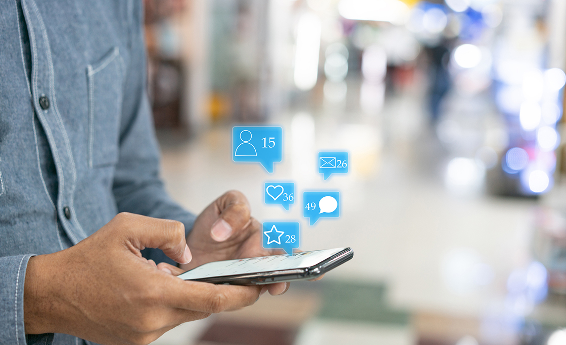 Hand touch screen smart phone. Application icons interface on screen. Social media concept