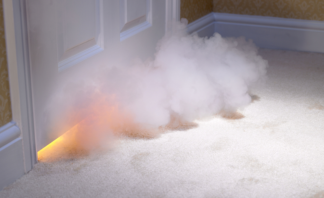 Smoke coming in under door