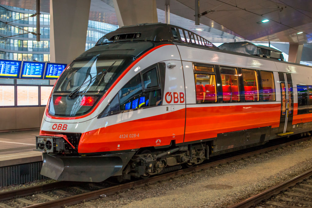 OBB Talent railcar approaching platform at Vienna Central station Hauptbanhauf, Austria