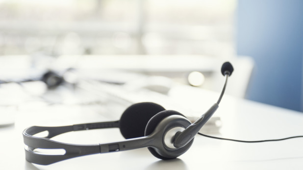 Phone headset on desk