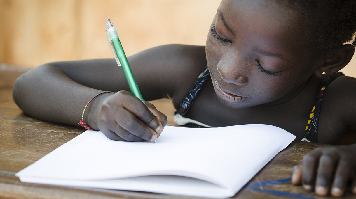 Schooling Symbol – African Young Girl Writing Notes