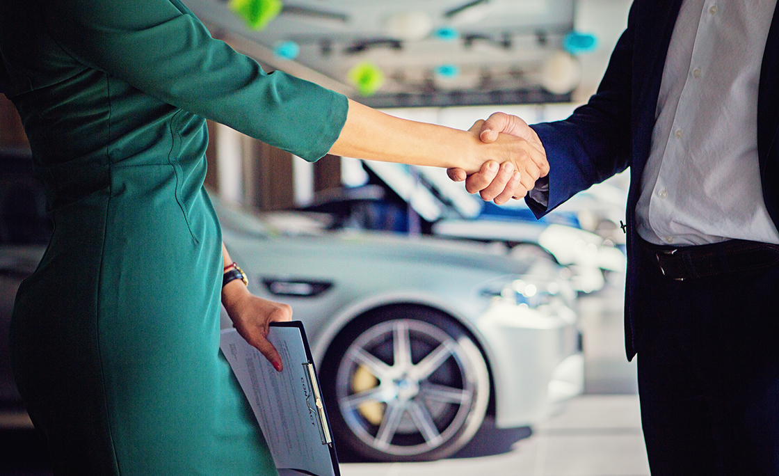 Car dealer sales car to the customer