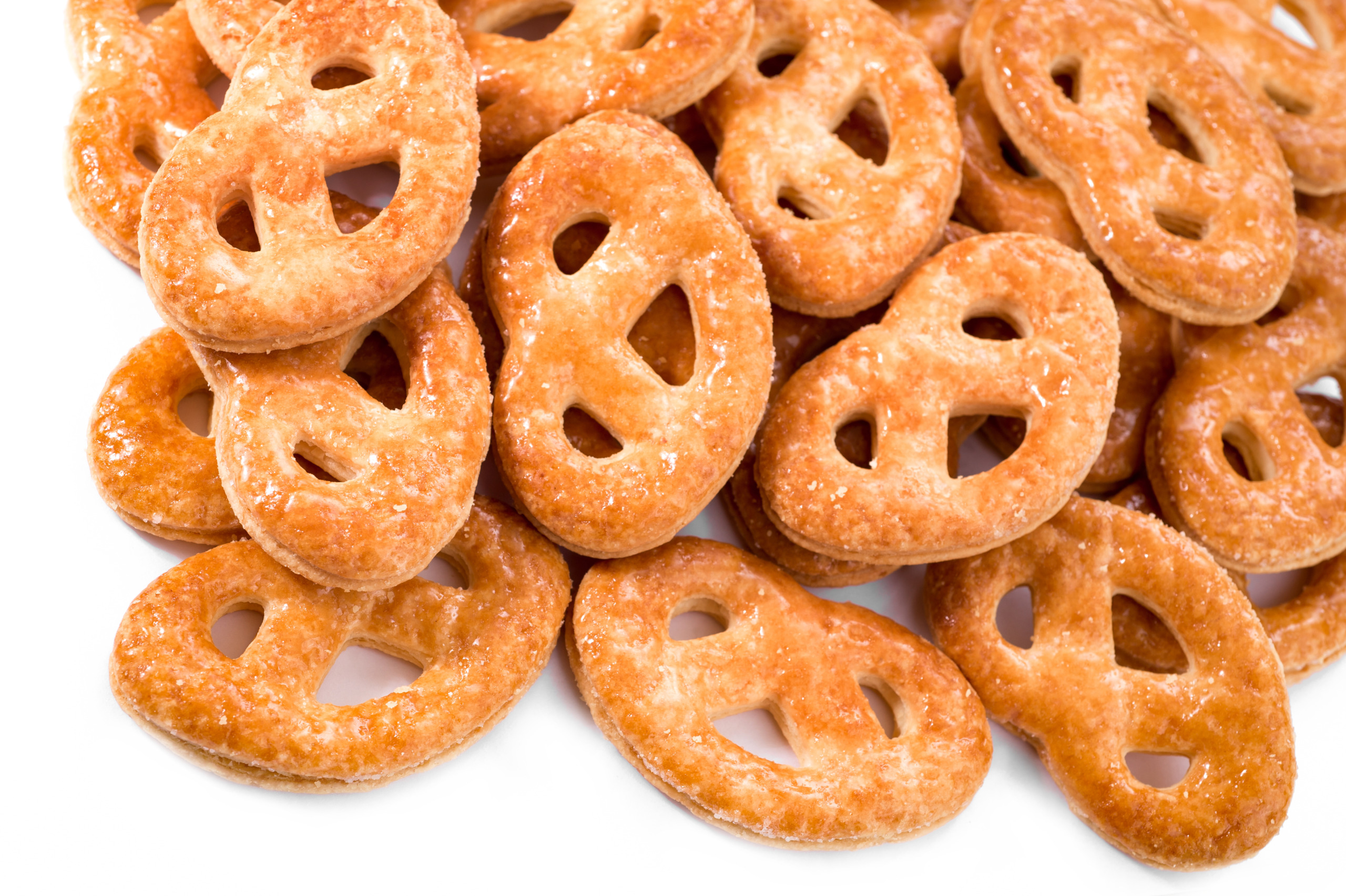 cookies stack closeup, Krakelingen  isolated on a white background