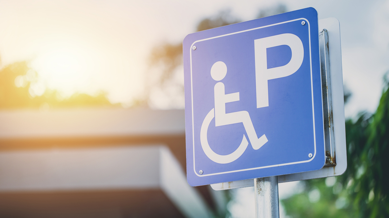 disability car parking sign to reserved space for handicap driver vehicle park
