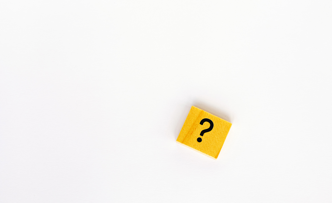 Question Mark on Wooden Block White Background