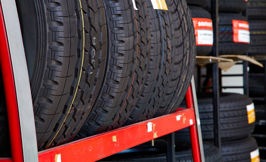 Car tires at warehouse in tire store