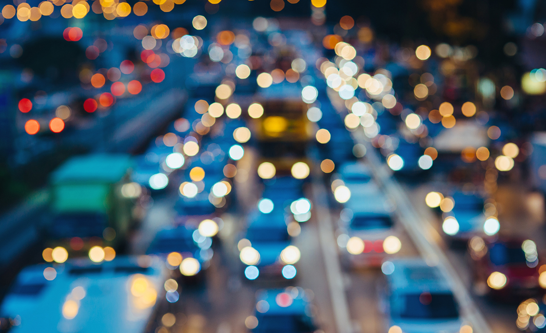 Defocused image of rush hour traffic on busy highway in the evening