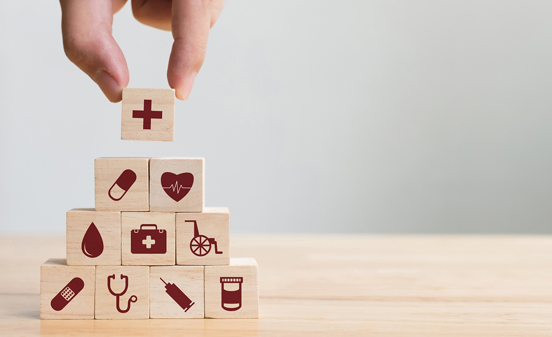Hand arranging wood block stacking with icon healthcare medical, Insurance for your health concept
