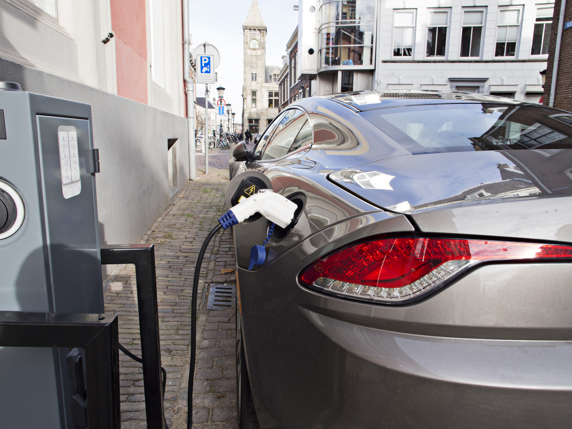 Electric car at recharging station