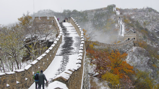 Hikers Walking At Great Wall Of China During Winter