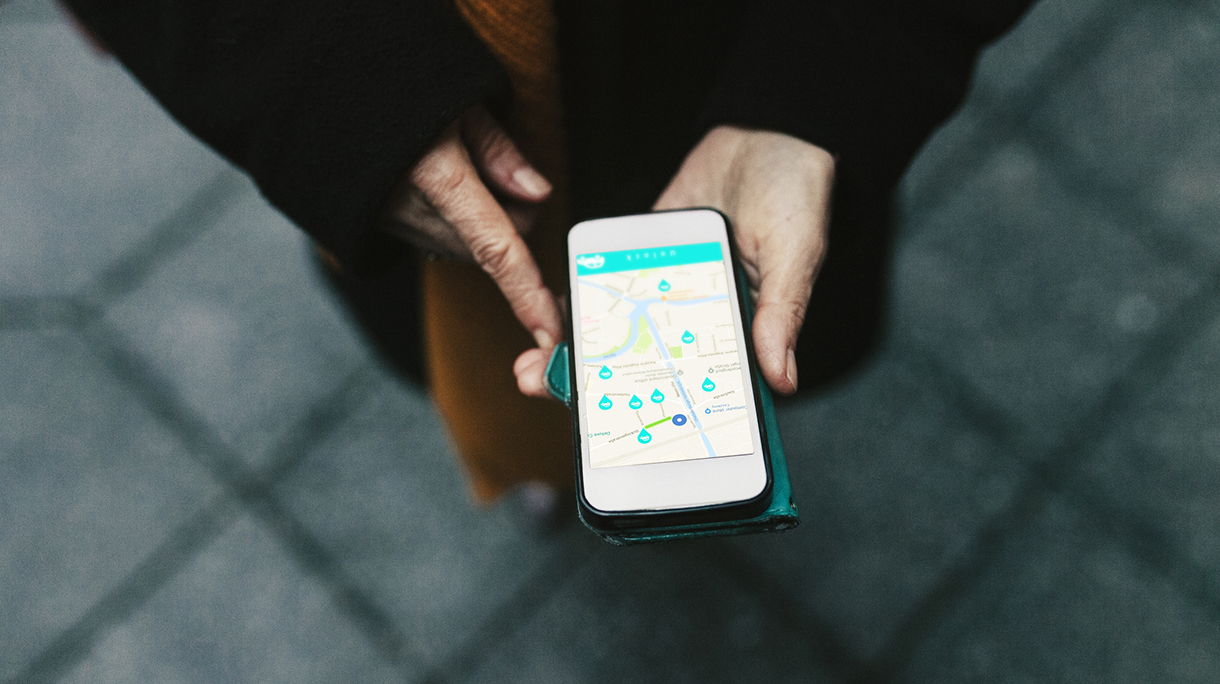 Aerial View On Woman Using Car Sharing App