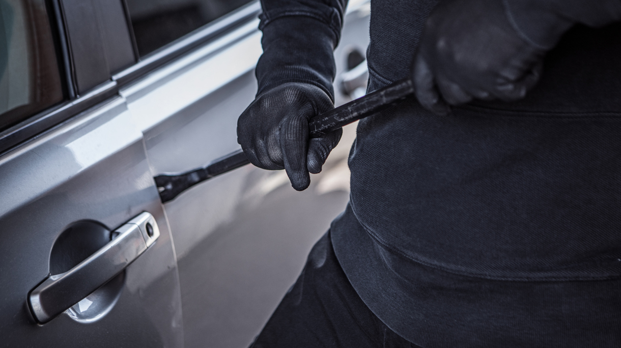Unknown Criminal stealing a car