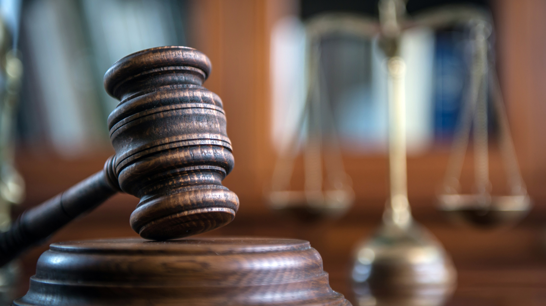 Law and Justice concept. Mallet of the judge, books, scales of justice.