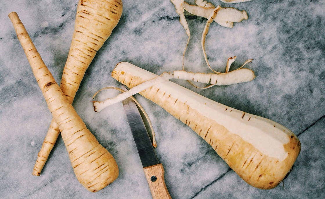 Directly Above View Of Parsnips With Knife On Table