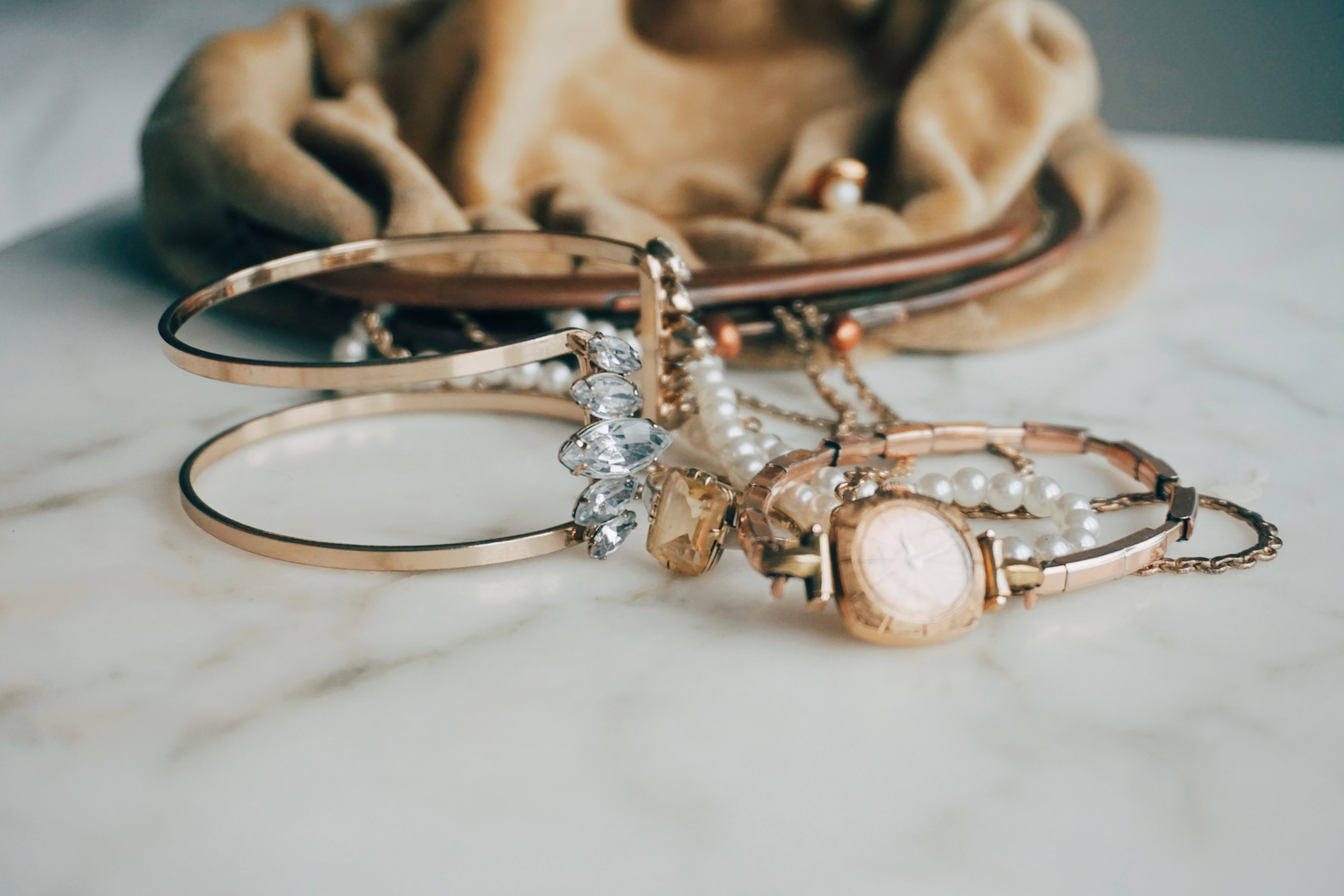 Directly Above Shot Of Jewelry By Purse On Table