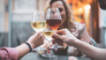 Friends Toasting Wineglasses In Restaurant