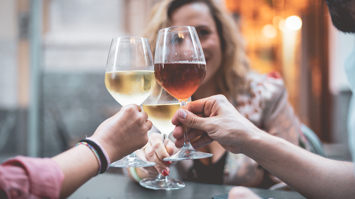 Friends Toasting Wineglasses In Restaurant