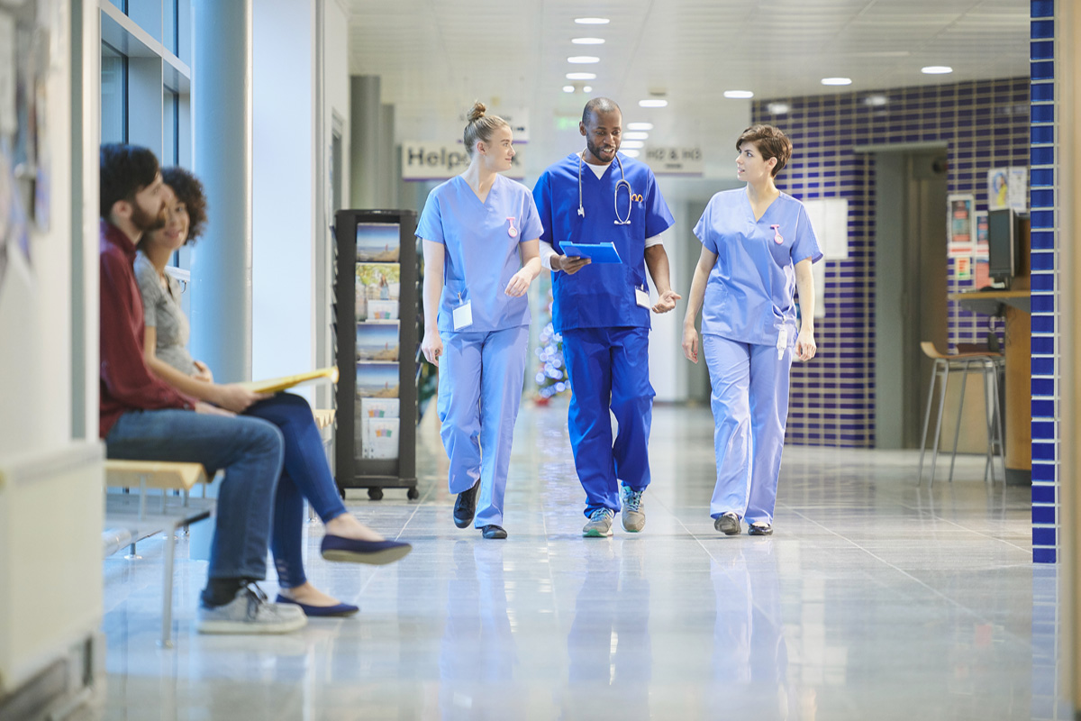 nurses chatting on the way to ward