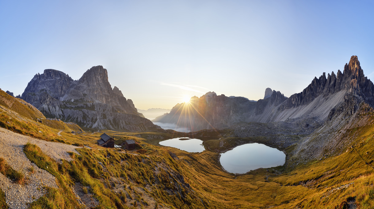 The famous Bödenseen lakes (Laghi dei Piani) and the mountain Innichriedlknoten near the Tre Cime di Lavaredo (Drei Zinnen) at sunrise. UNESCO World Heritage Site.