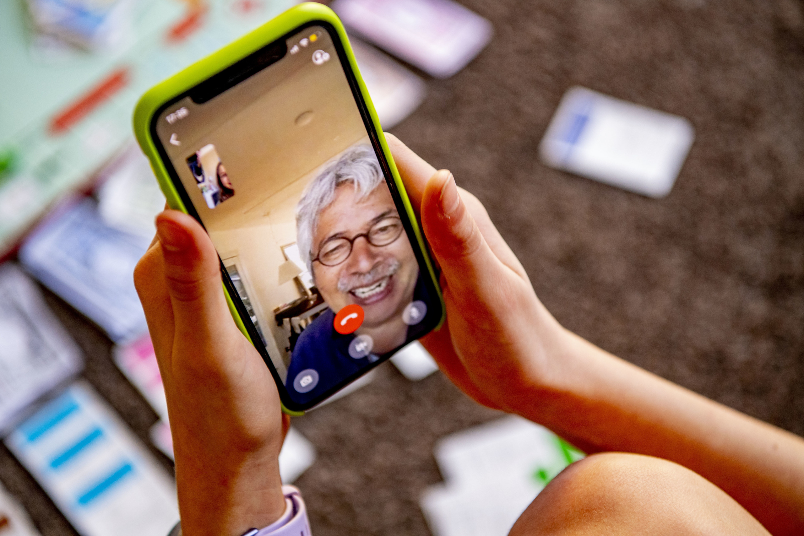 In this photo illustration a family video call on FaceTime