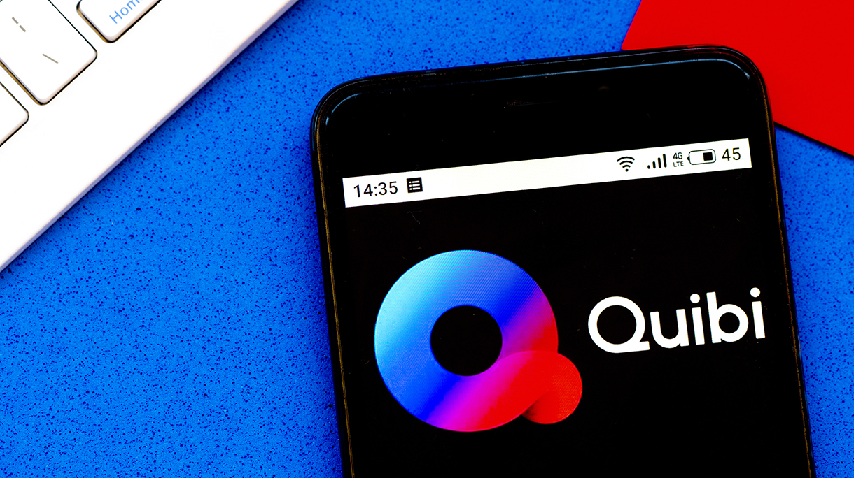 In this photo illustration a Quibi logo seen displayed on a