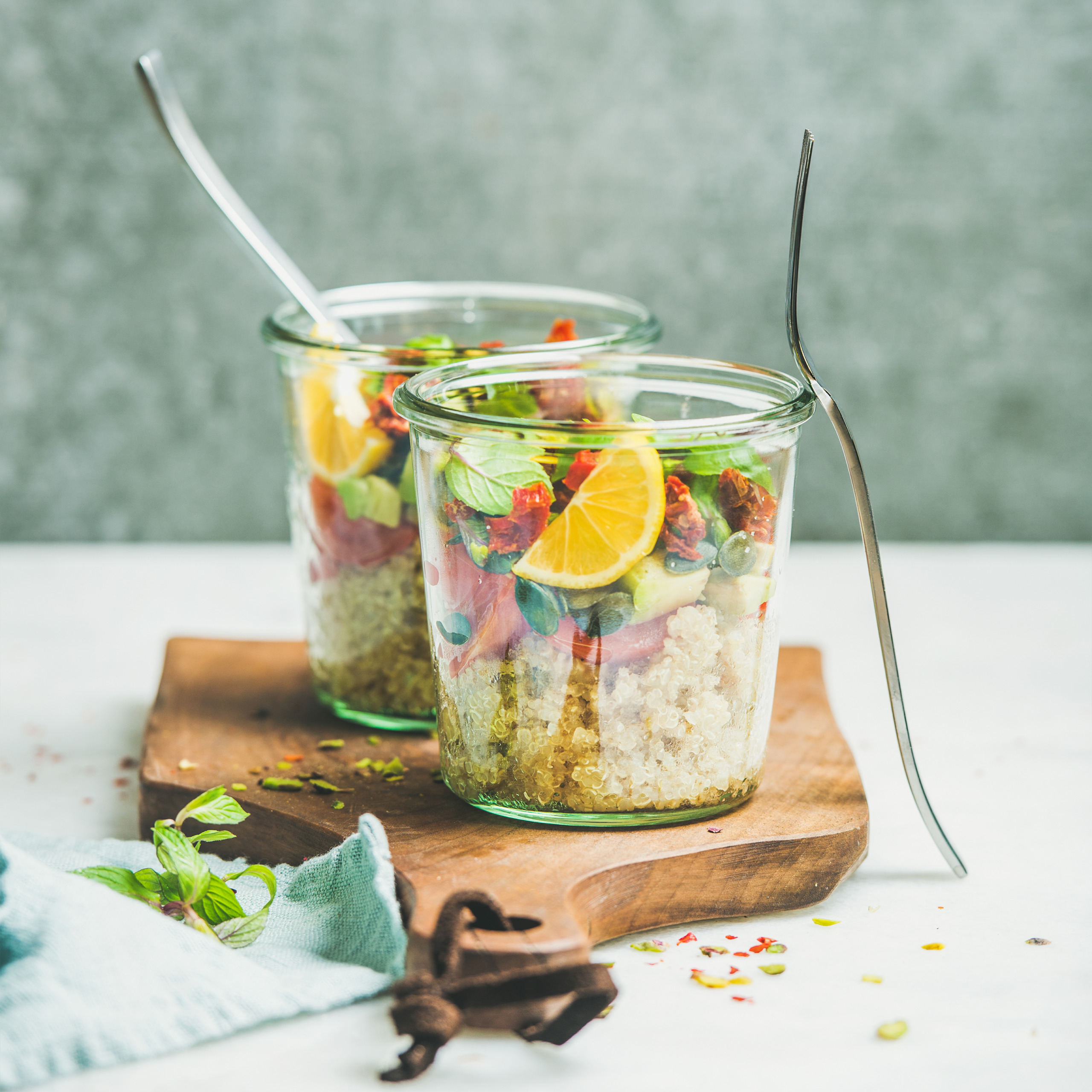 Healthy vegetarian salad with quionoa, avocado, dried tomatoes