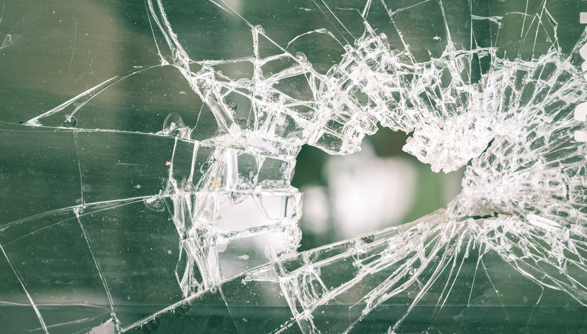 Full Frame Shot Of Broken Glass Window