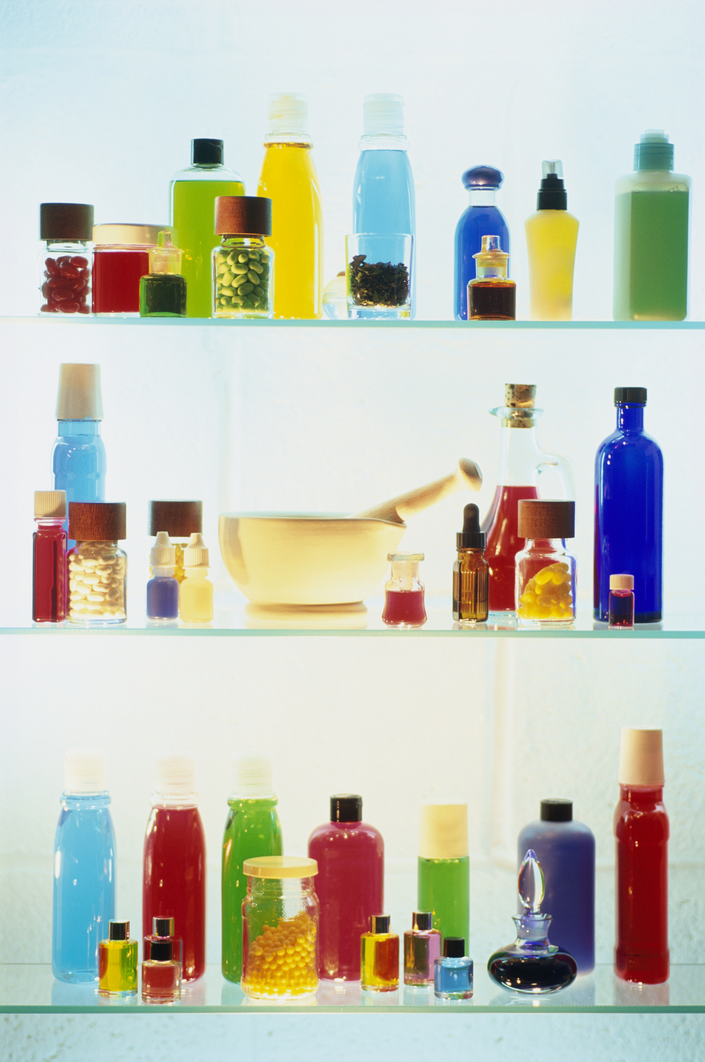 Colored Bottles in Medicine Cabinet