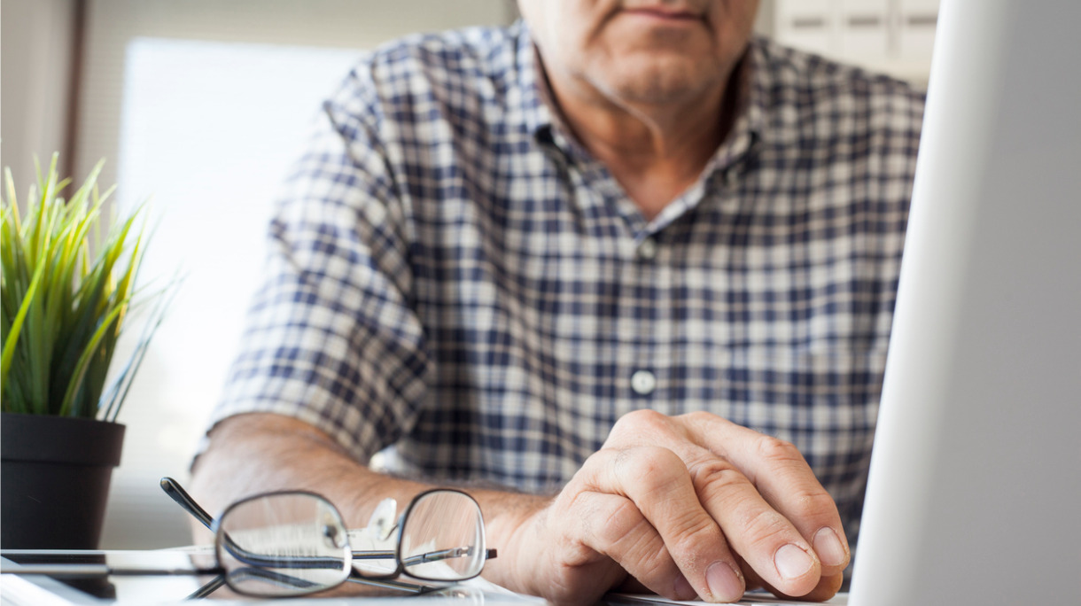 senior-man-working-on-computer-picture-id619271024