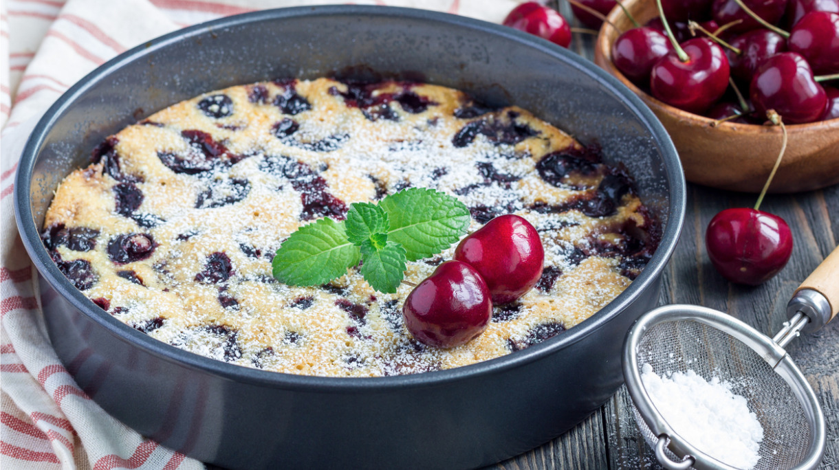 clafoutis-with-cherry-in-baking-dish-horizontal-picture-id601131534