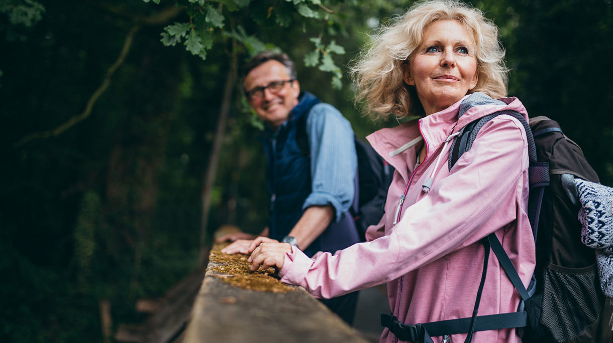 Senior Couple enjoying hike in the forest
