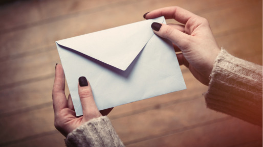 hands-opening-envelope-picture-id667590908_0