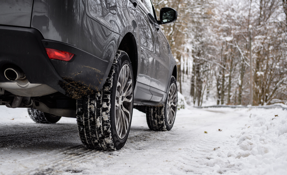 Close-up of winter car tires mounted on a sport utility vehicle