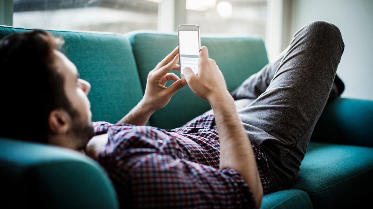 Young man using smart phone