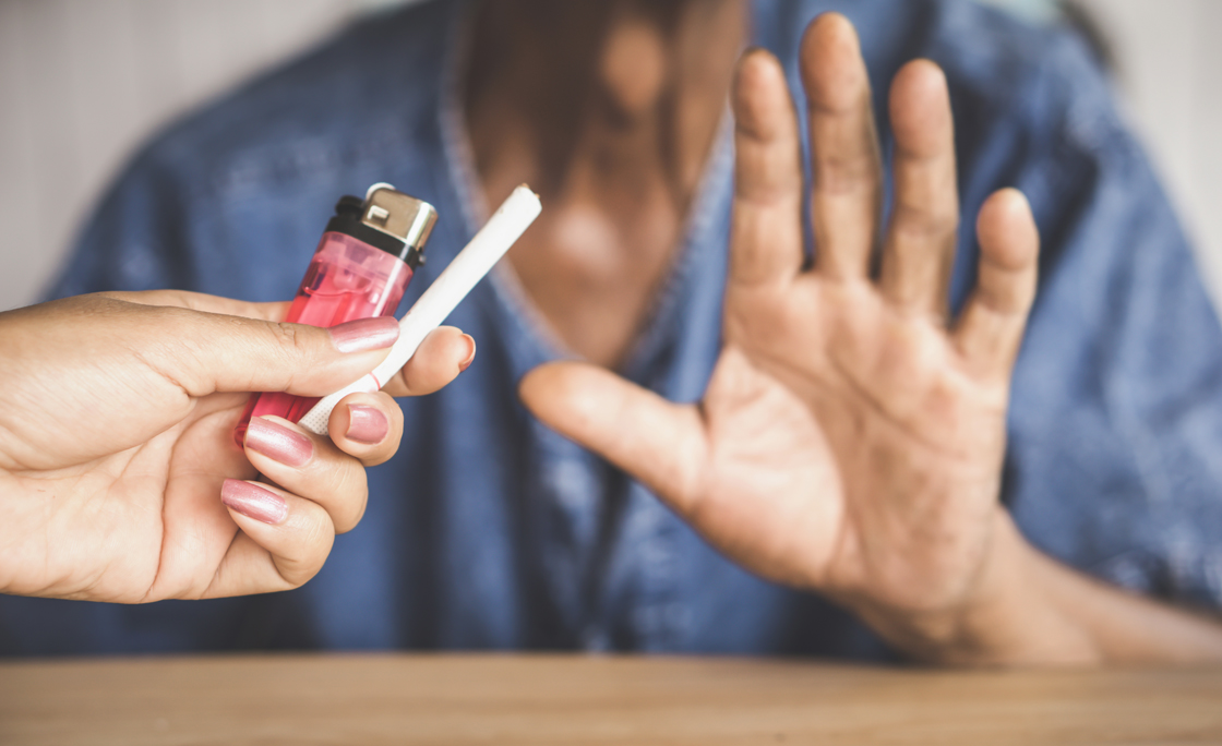 Close-Up Of Man Refusing Cigarette