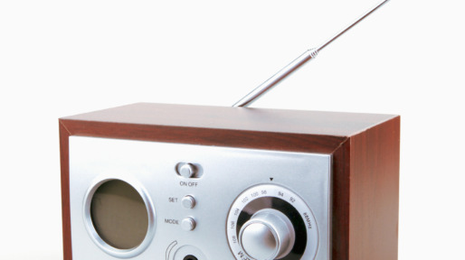Close-Up Of Old Retro Radio Against White Background