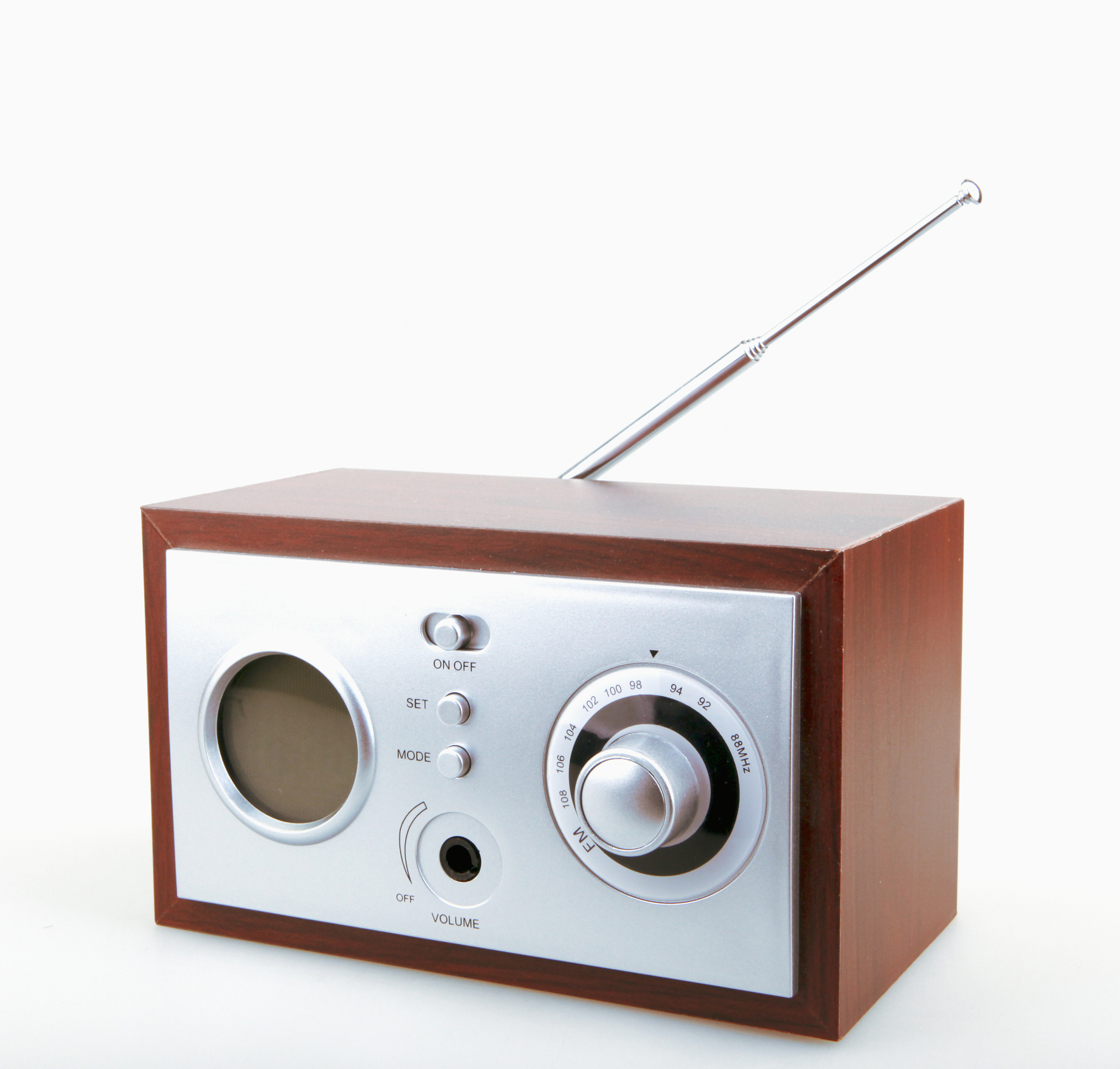 Close-Up Of Old Retro Radio Against White Background