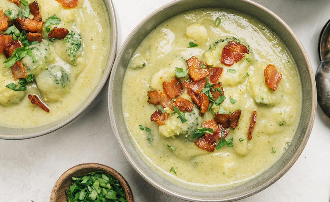 Potato and broccoli soup with bacon table setting