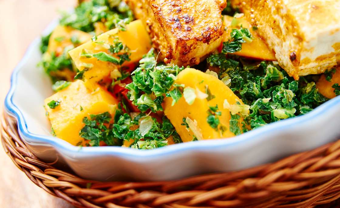Close-Up Of Kale With Sweet Potato And Tofu In Basket