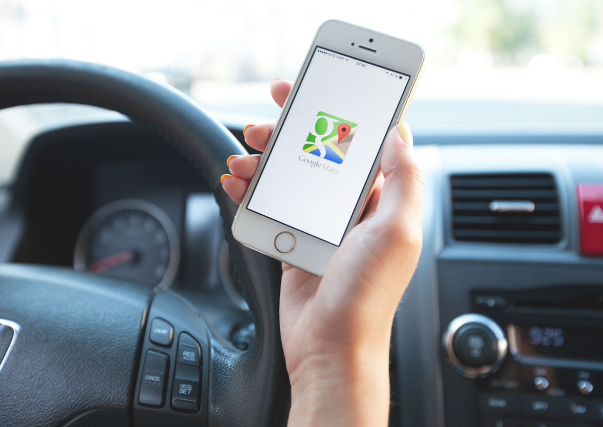 Google Maps navigation on Apple iPhone in use.