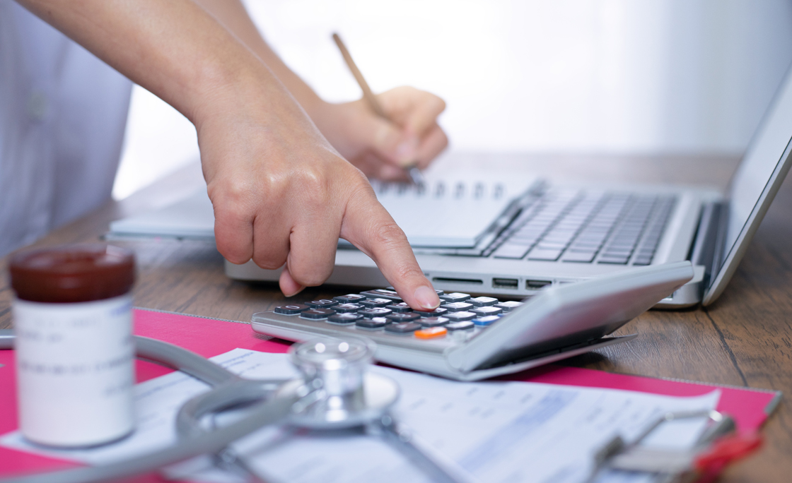 Calculate drug cost.,doctor is calculating cost of treatment