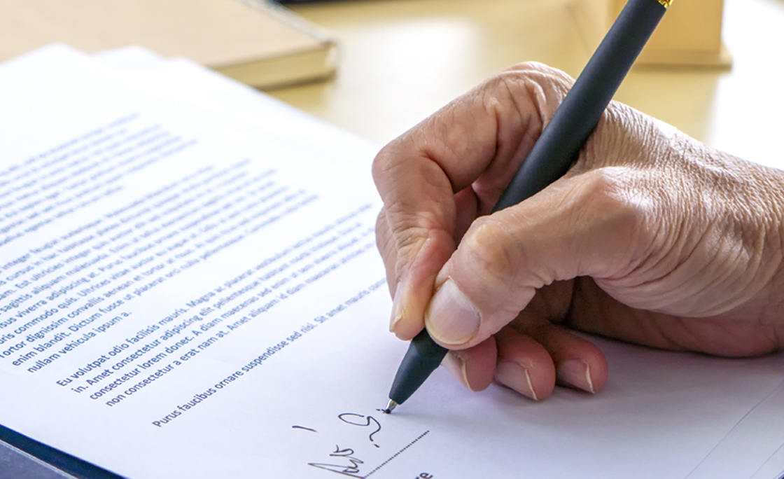 Signing Official Document Or Contract.
