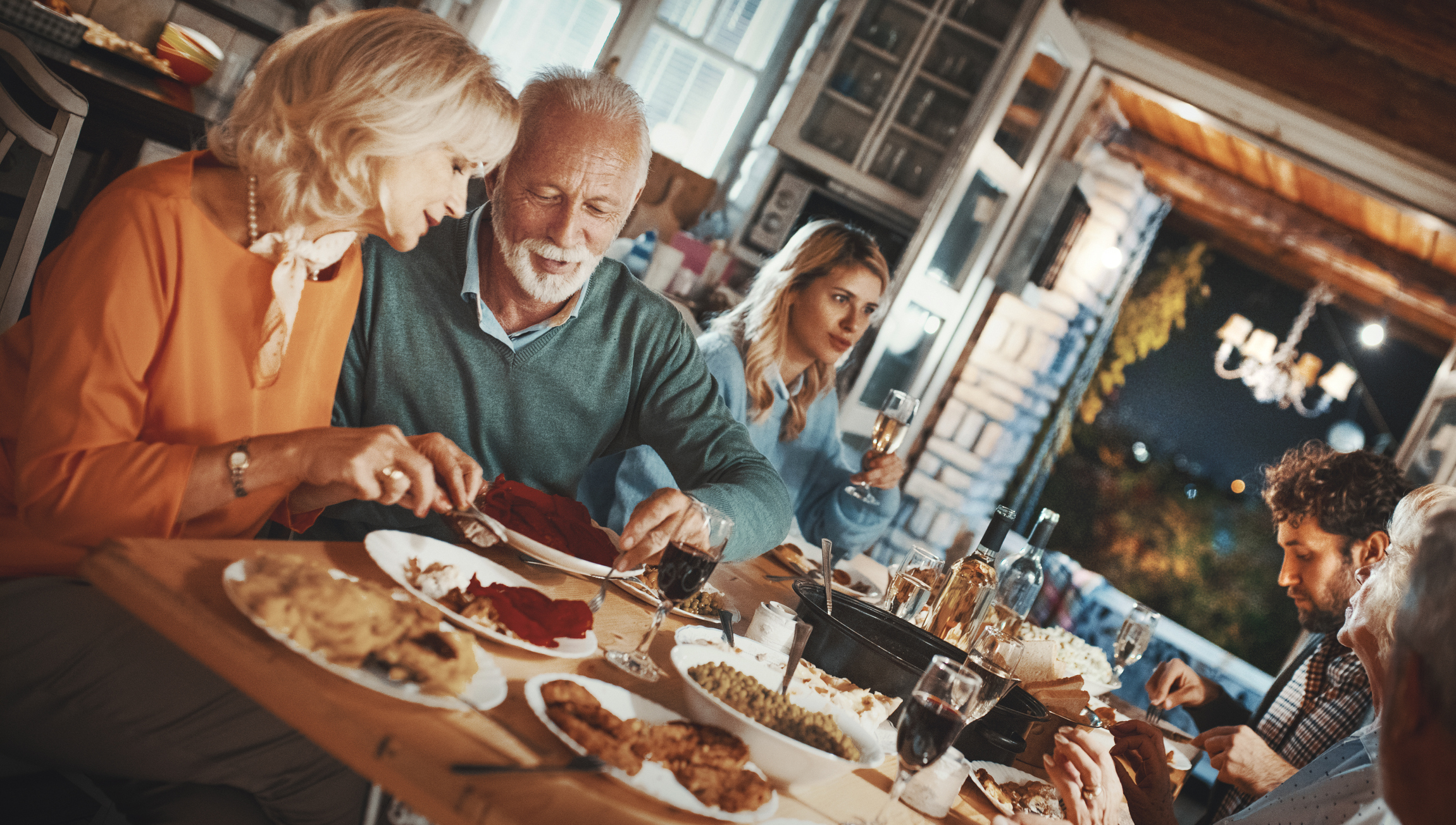 Family having Thanksgiving dinner.