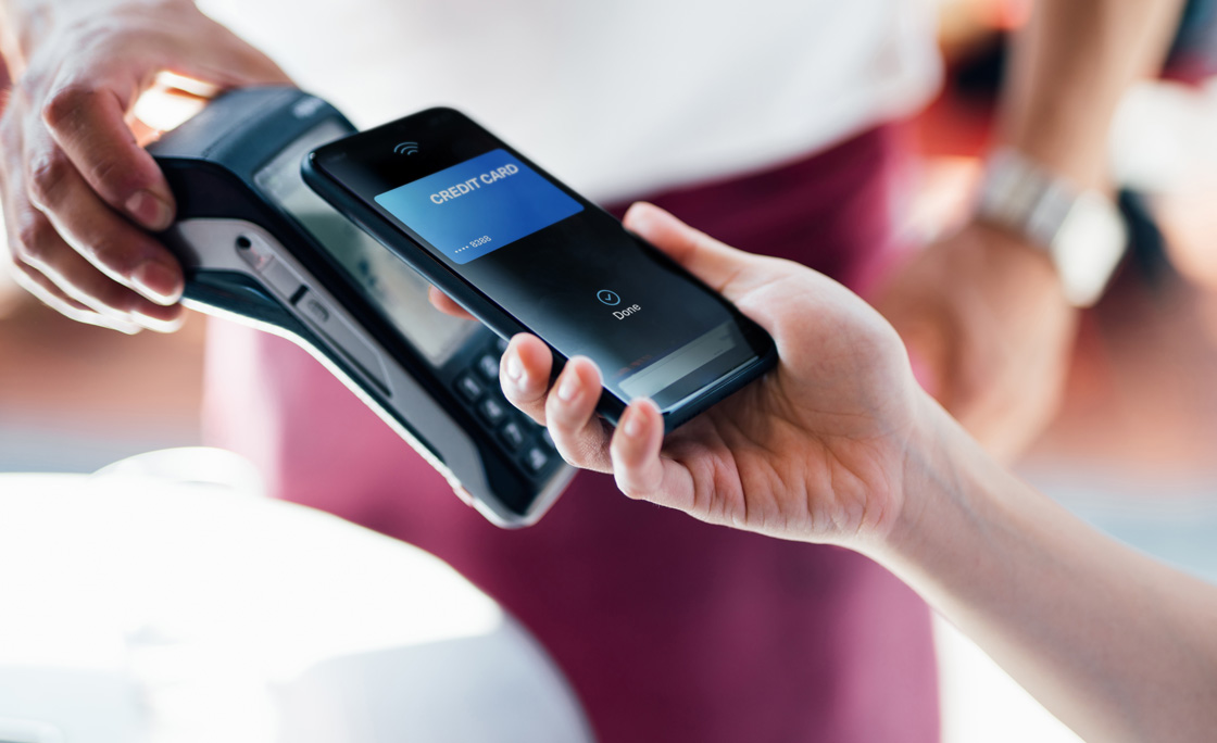 Paying With Mobile Phone At Restaurant