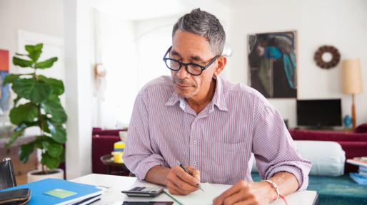 Mature man doing working at home