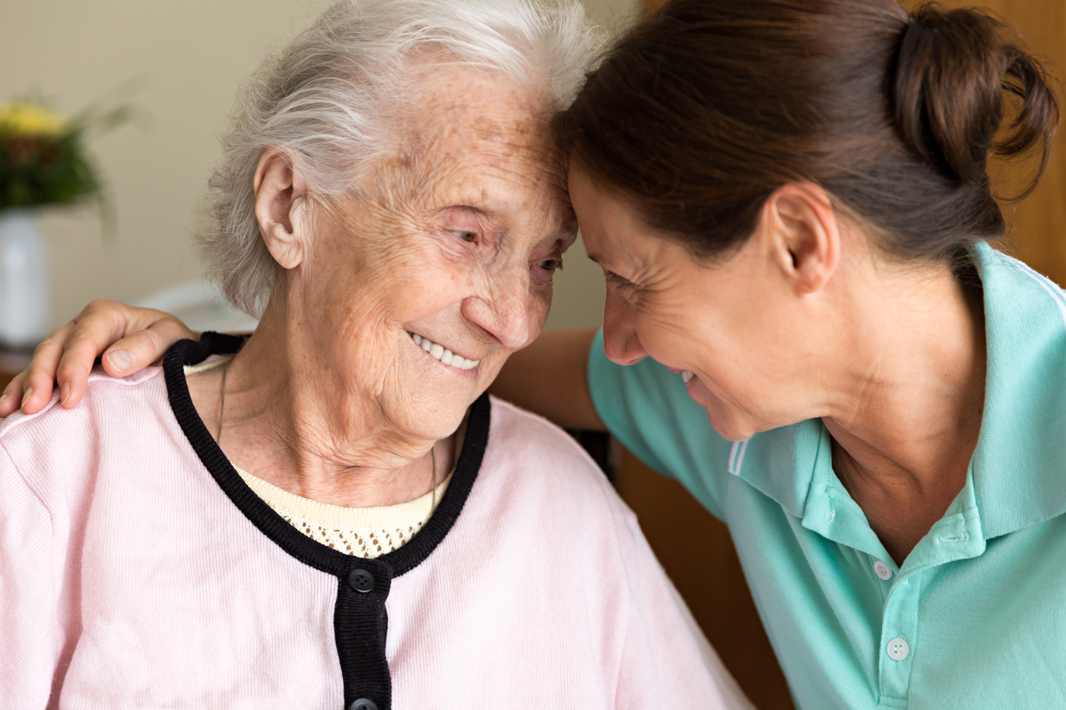 Dementia and Occupational Therapy – Home caregiver and senior adult woman
